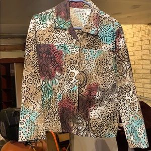 Women’s button down long sleeve shirt.